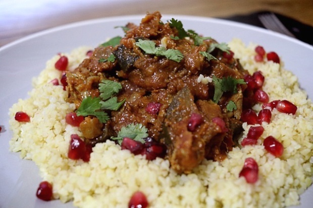 Lamb tagine with vegetables served with bulgar wheat and pomegranate seeds