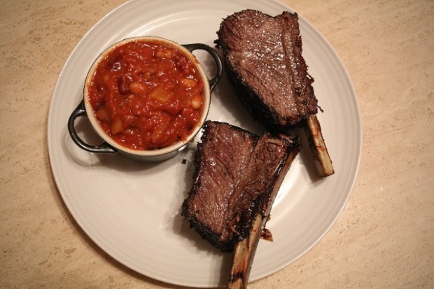 Slow cooked short ribs served with smokey chipotle beans
