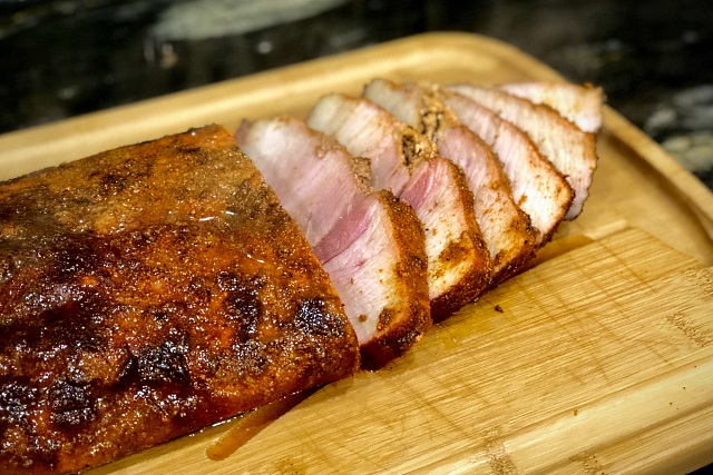 Pork leg steak glazed and sliced