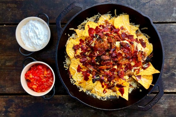 Cheesey pulled pork nachos with side dishes